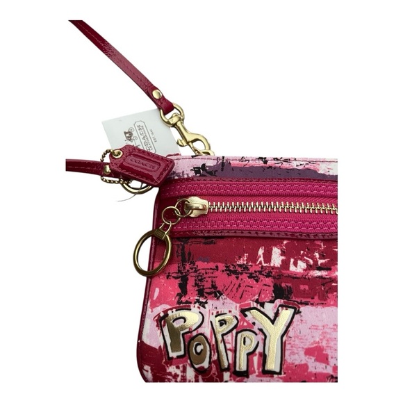 Coach Poppy Graffiti Wristlet NWT
MSRP $178.00 - Picture 3 of 7